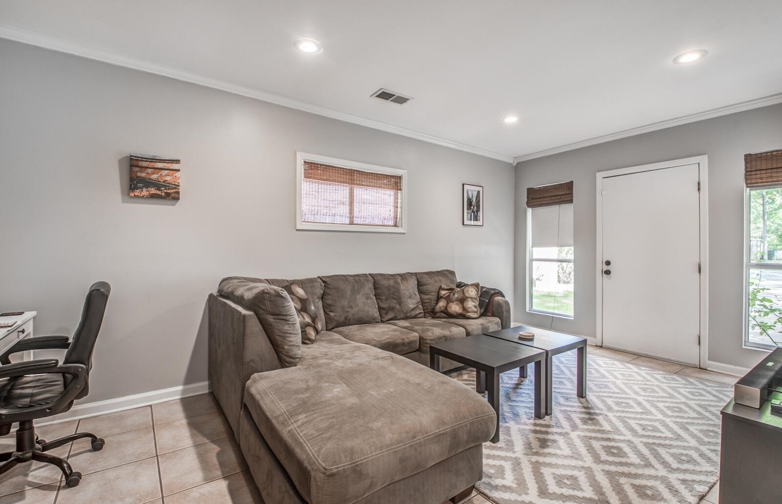 1377 Marcia Road Memphis, TN 38117 - Photo 11 of 24 a living room with furniture and a window