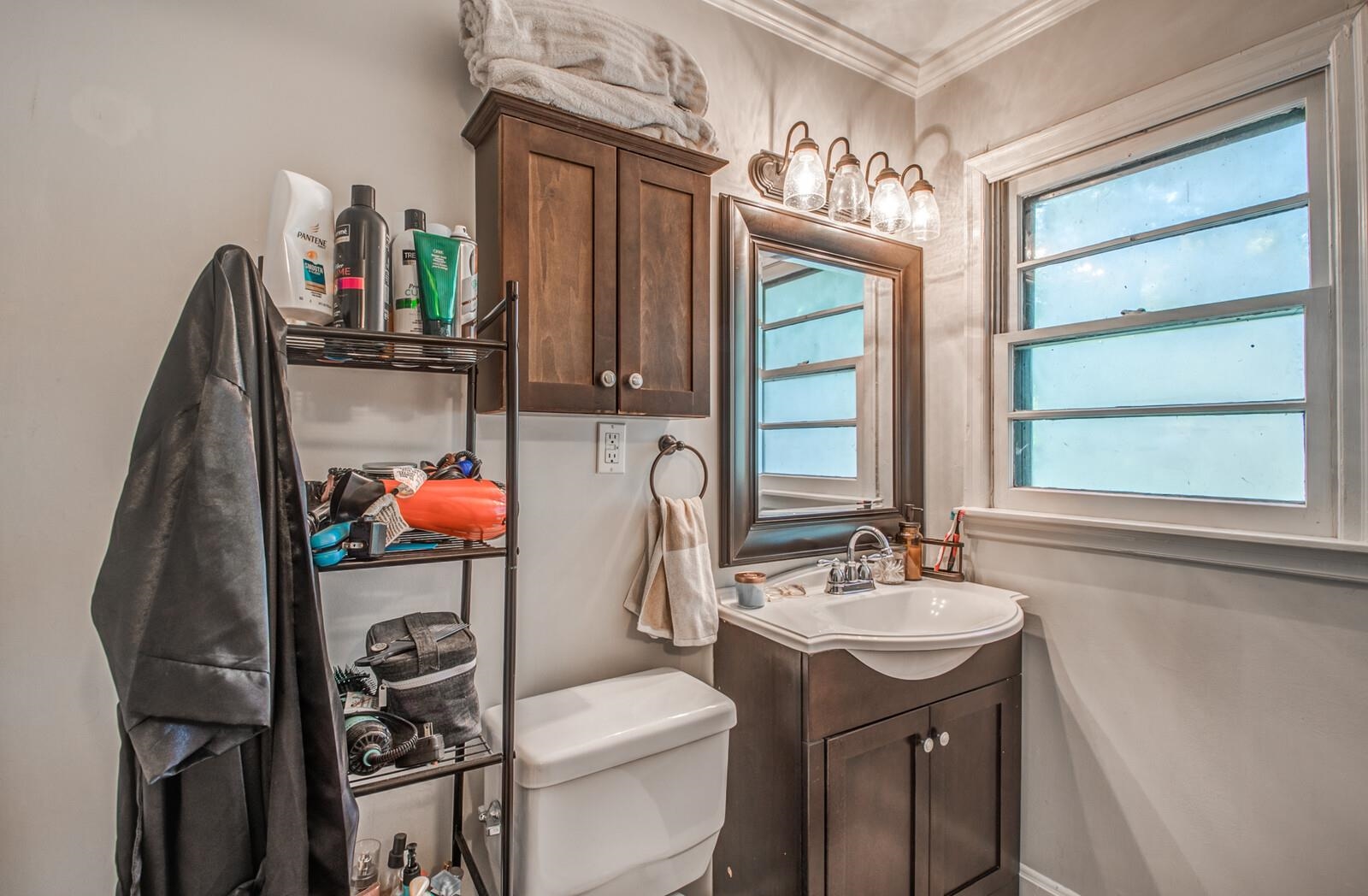 1377 Marcia Road Memphis, TN 38117 - Photo 16 of 24 a bathroom with a sink toilet and a shower