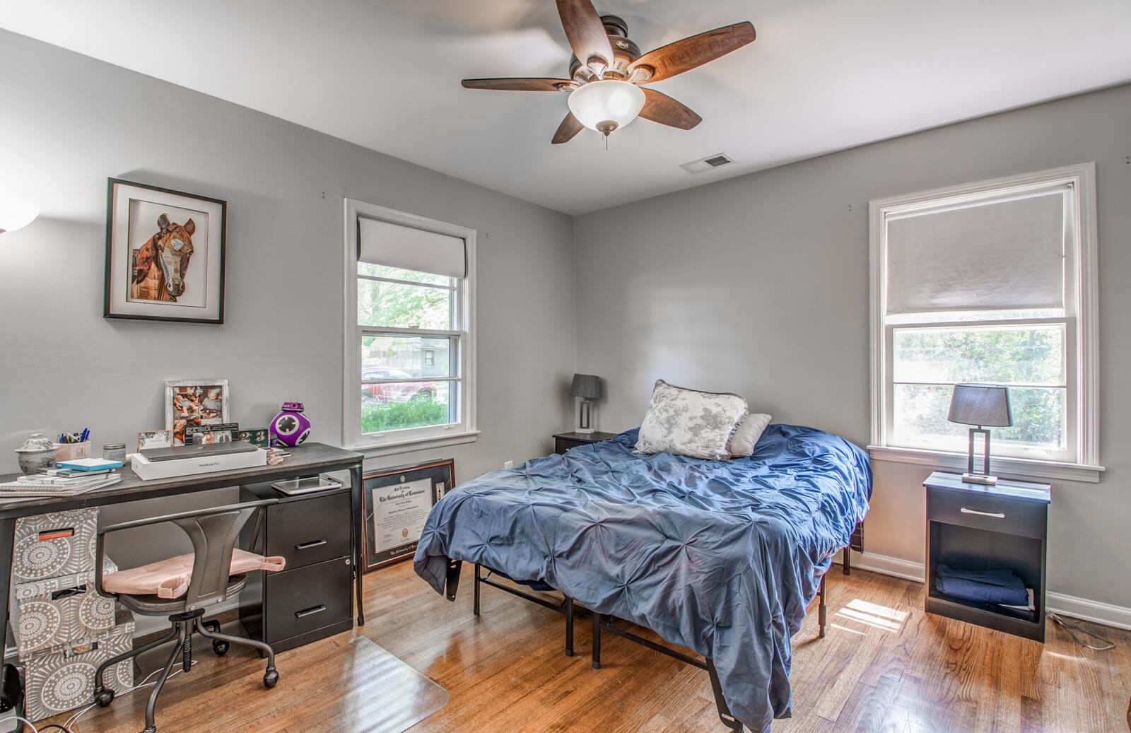 1377 Marcia Road Memphis, TN 38117 - Photo 19 of 24 a bedroom with a bed and a table