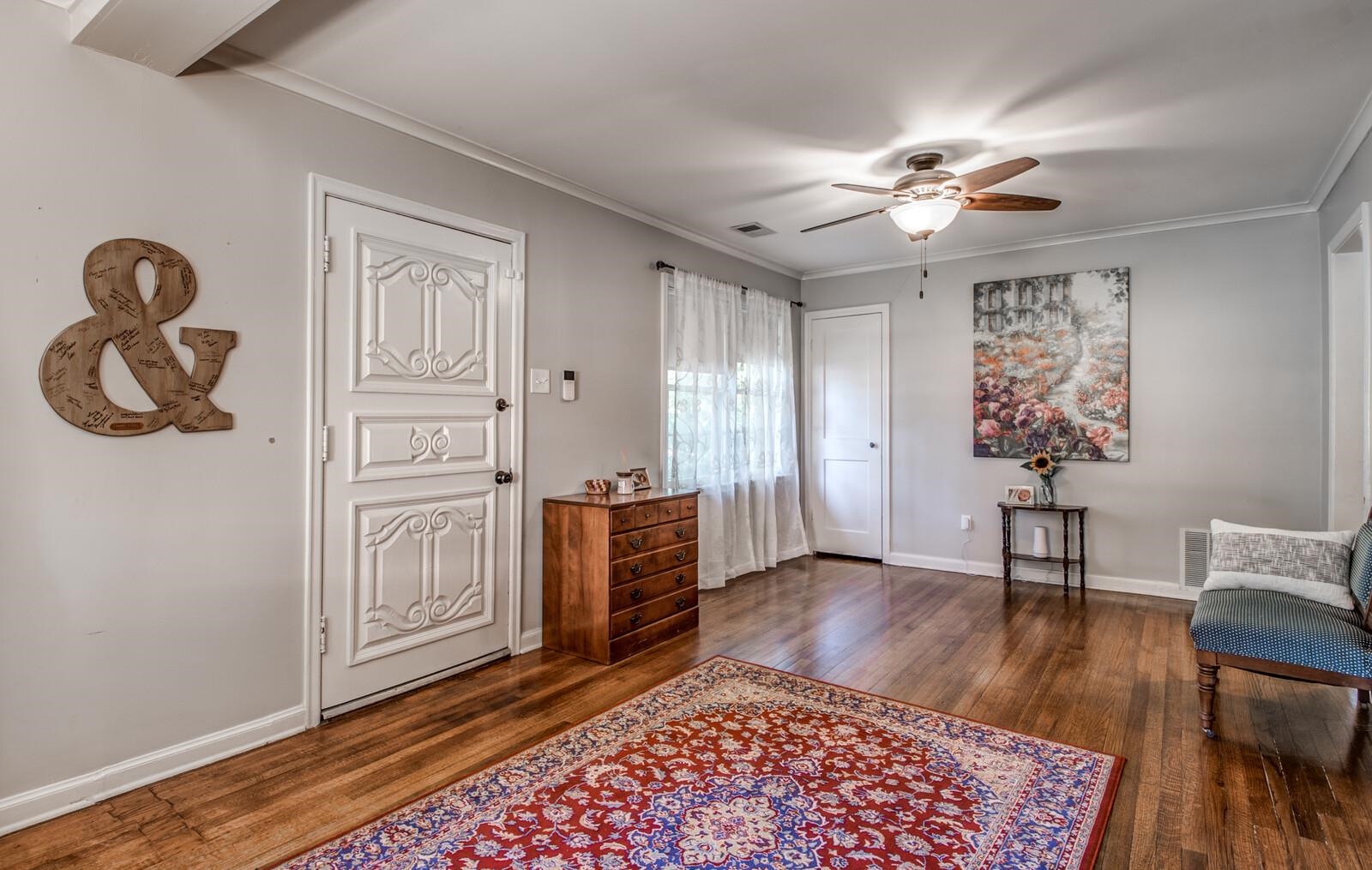 1377 Marcia Road Memphis, TN 38117 - Photo 5 of 24 a view of a livingroom with furniture and wooden floor