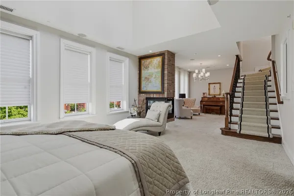 a bedroom with a bed and furniture