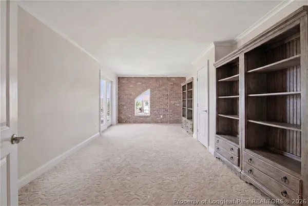 a view of balcony with furniture