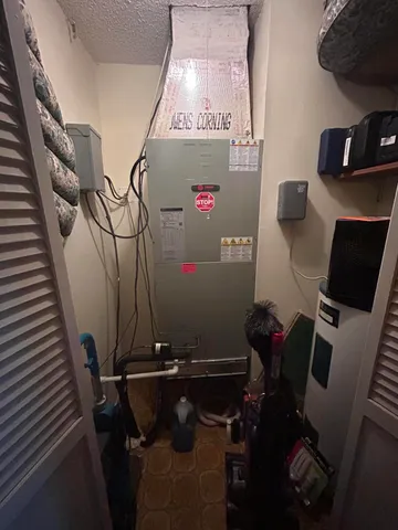 a view of a workspace with furniture