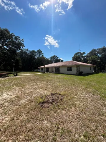 a view of a house with a outdoor space