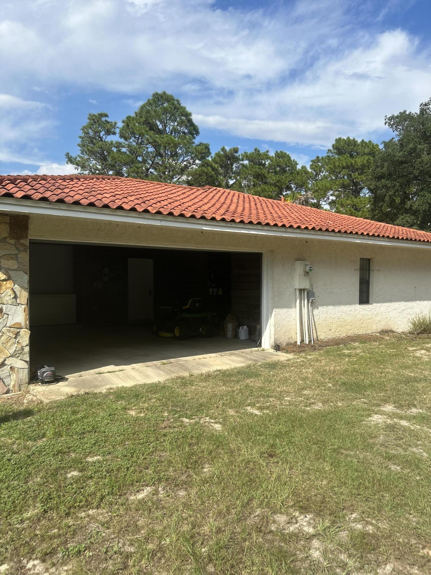 329 Sunflower Lane Freeport, FL 32439 - Photo 27 of 39 a view of a house with a outdoor space