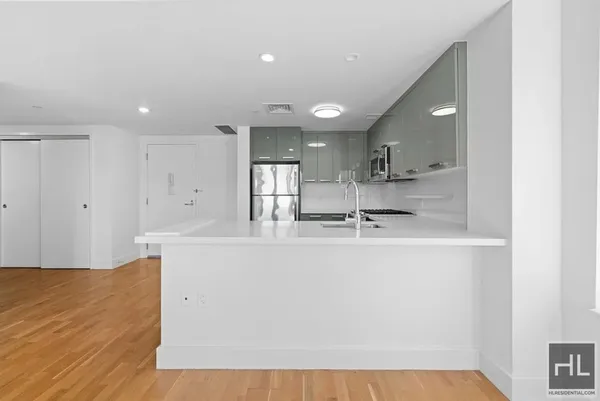 a view of kitchen with counter top space