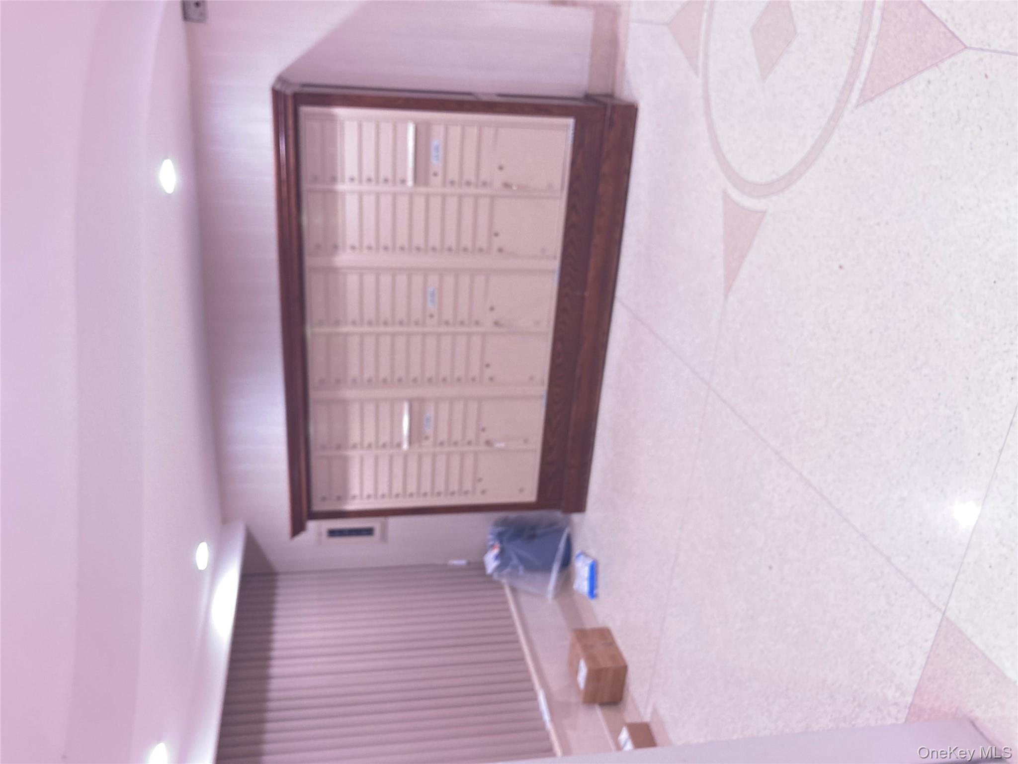 62-59 108th Street, Unit 6E Queens, NY 11375 - Photo 10 of 14 a view of an empty room with windows