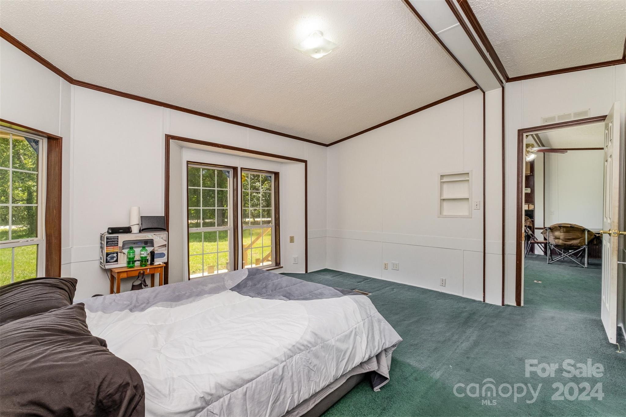 1680 Thompson Quarters Road Sharon, SC 29742 - Photo 21 of 37 a bedroom with a bed and a large window