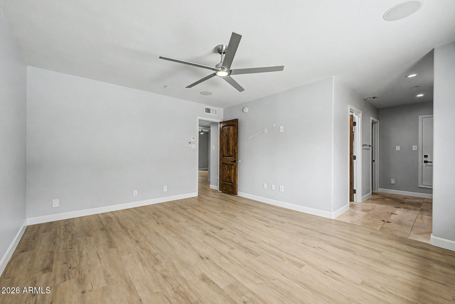 2311 East Colter Street Phoenix, AZ 85016 - Photo 30 of 93 wooden floor in an empty room with a window