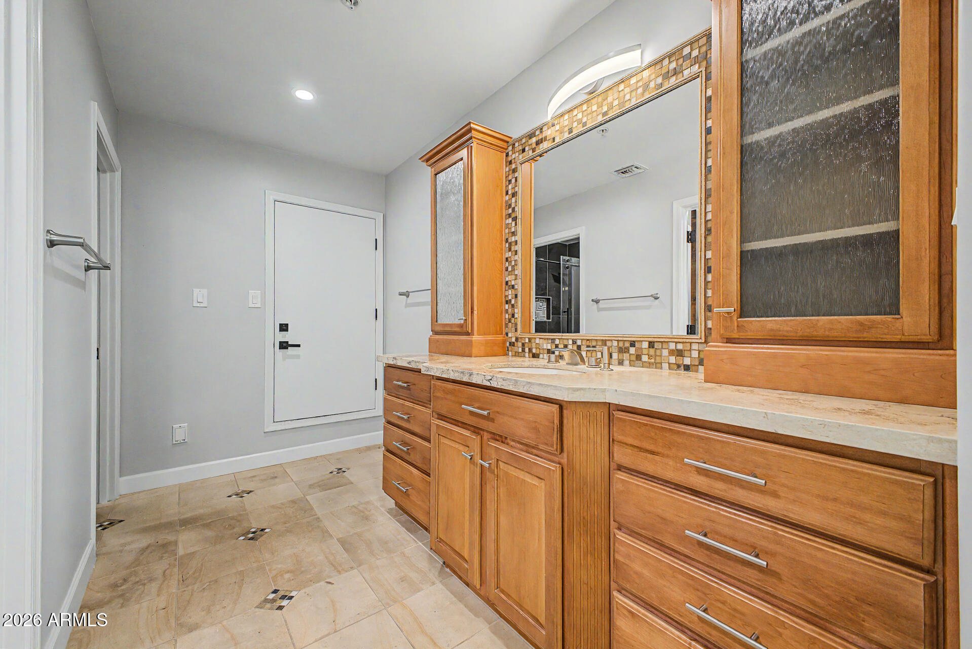 2311 East Colter Street Phoenix, AZ 85016 - Photo 31 of 93 a spacious bathroom with a shower sink and mirror