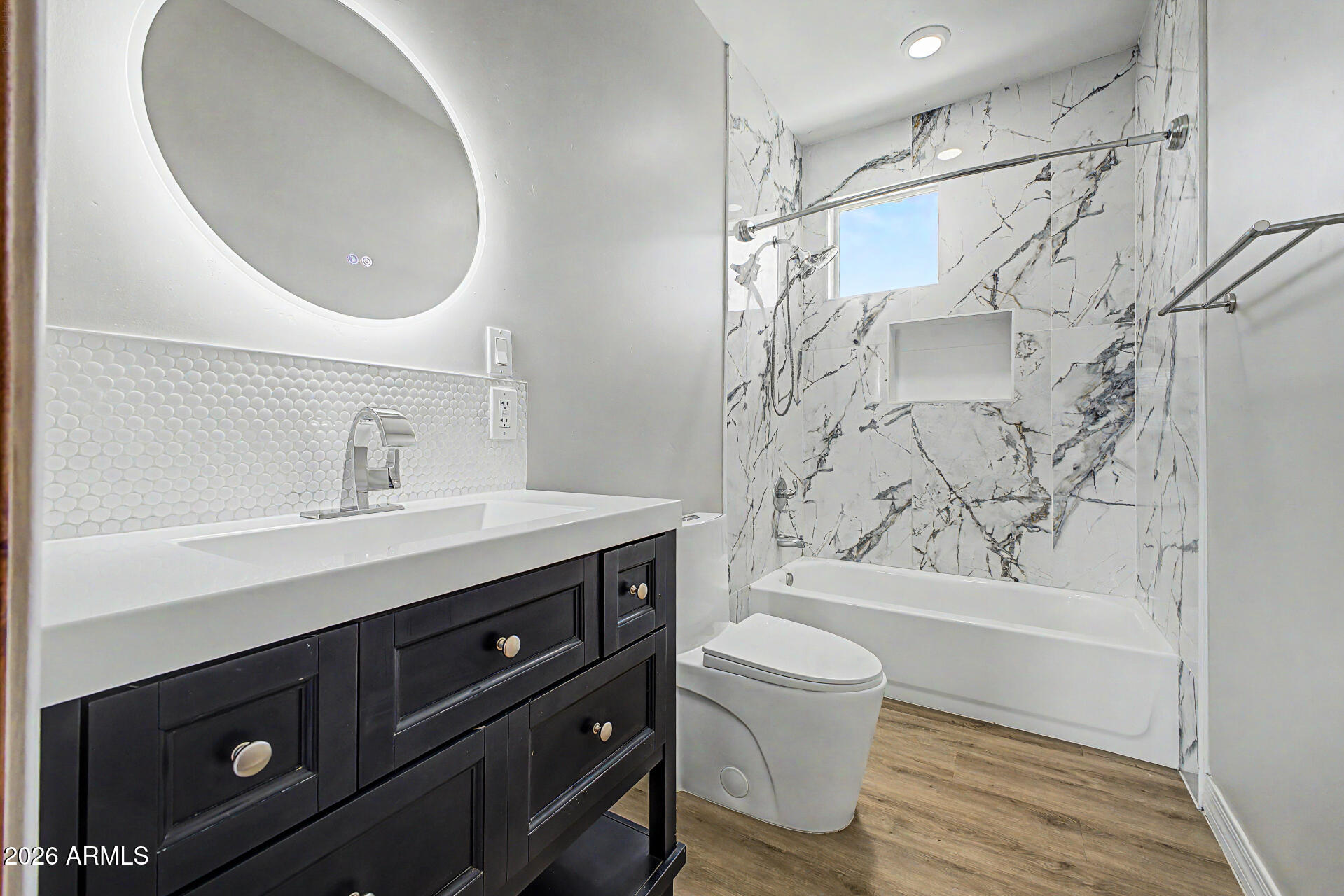 2311 East Colter Street Phoenix, AZ 85016 - Photo 57 of 93 a bathroom with a sink a toilet and shower