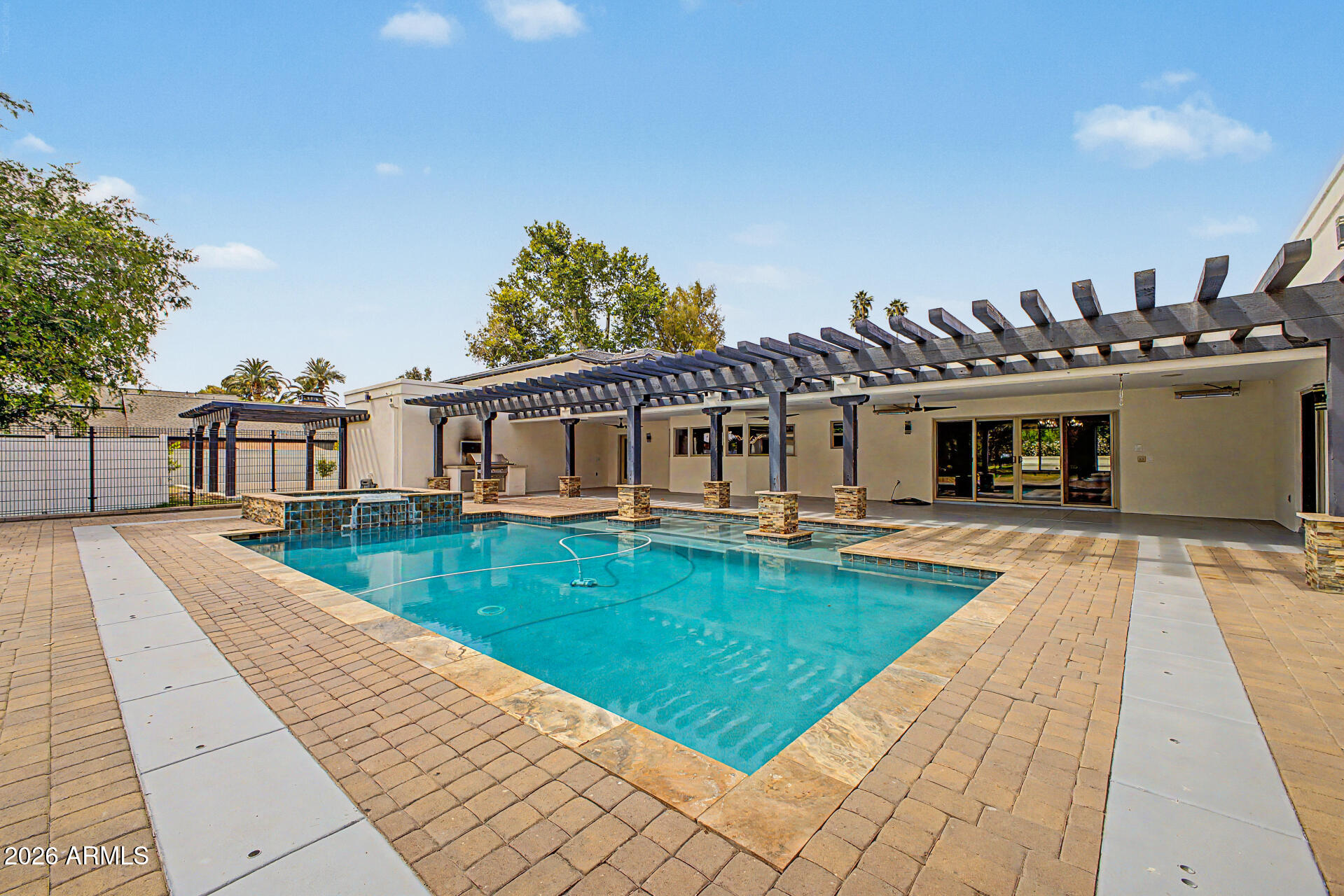 2311 East Colter Street Phoenix, AZ 85016 - Photo 70 of 93 a view of a house with swimming pool