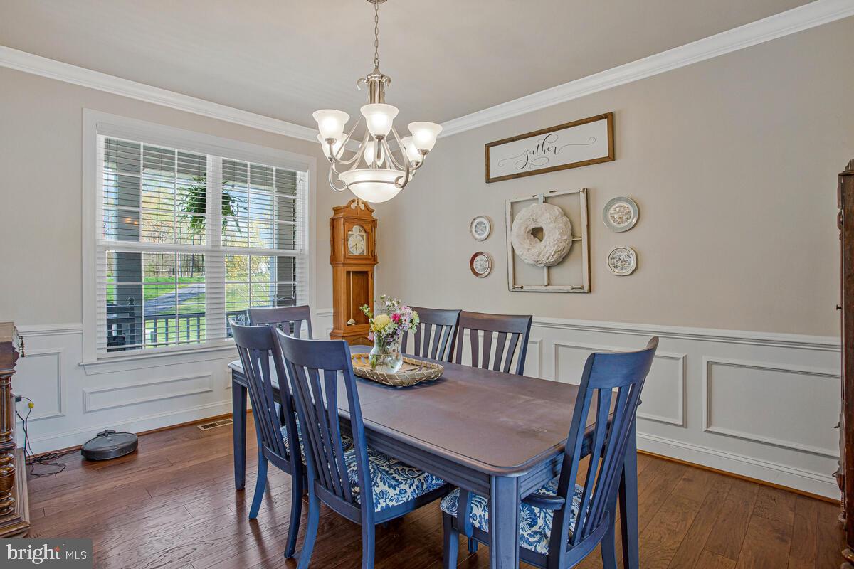 54 Simmons Ridge Road Prince Frederick, MD 20678 - Photo 9 of 55 a view of a dining room with furniture window and outside view