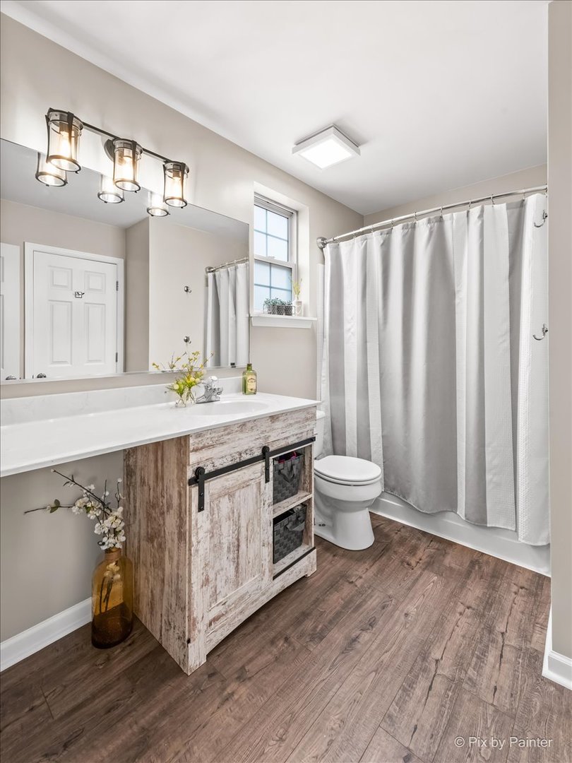10884 Cape Cod Lane Huntley, IL 60142 - Photo 14 of 22 a bathroom with a granite countertop sink and a toilet