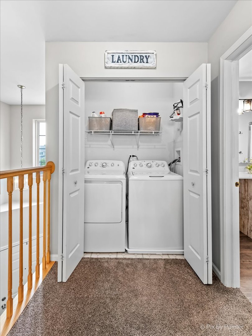 10884 Cape Cod Lane Huntley, IL 60142 - Photo 16 of 22 a utility room with dryer and washer