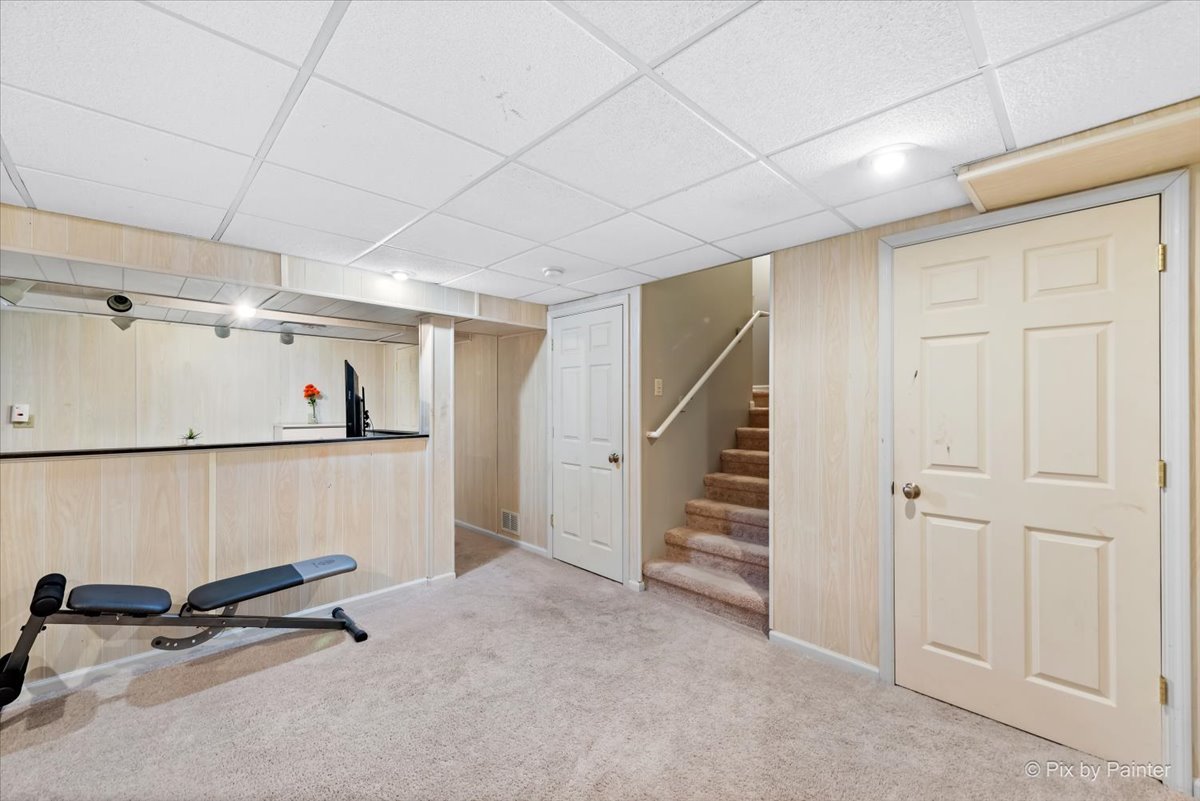 10884 Cape Cod Lane Huntley, IL 60142 - Photo 17 of 22 a view of a room with gym equipment