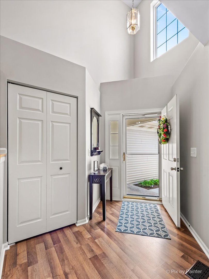 10884 Cape Cod Lane Huntley, IL 60142 - Photo 2 of 22 a view of room with window and wooden floor