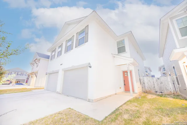 a view of a house with a swimming pool
