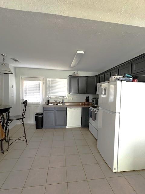 210 Hilltop Circle Blue Ridge, TX 75424 - Photo 3 of 13 a kitchen with cabinets and white stainless steel appliances