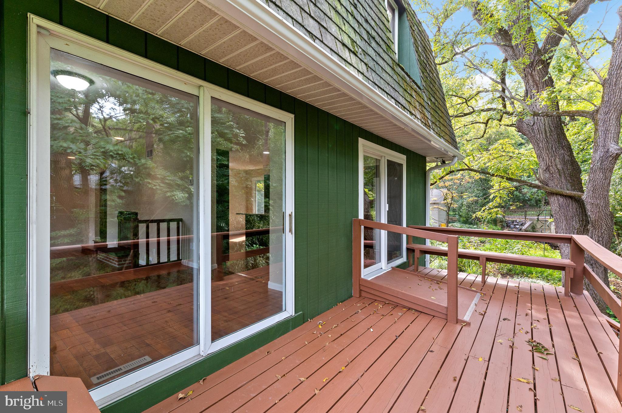 502 King Of Prussia Road Wayne, PA 19087 - Photo 33 of 36 Sliders to Deck from Kitchen and Dining Room