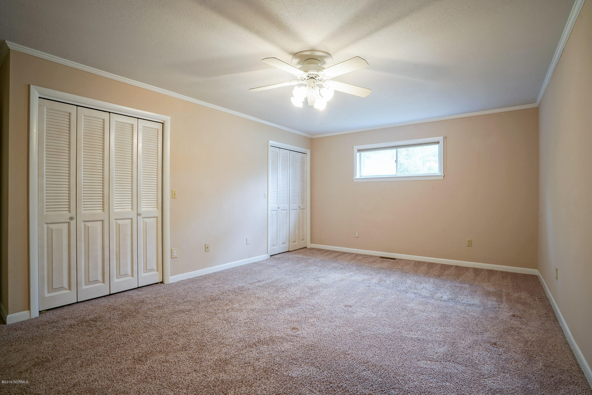 117 Holly Road Pine Knoll Shores, NC 28512 - Photo 15 of 25 Master Bedroom