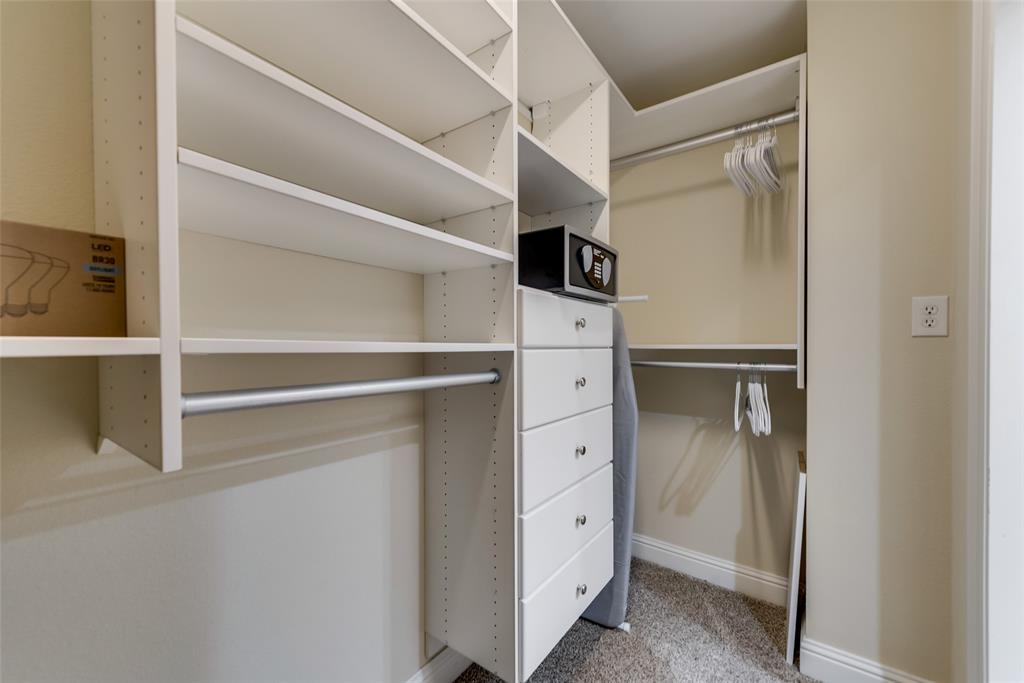 4973 Thunder Road, Unit B Dallas, TX 75244 - Photo 20 of 22 a view of walk in closet