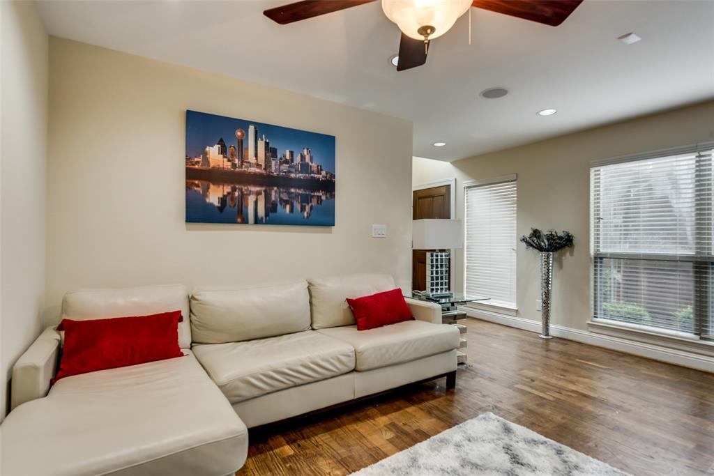 4973 Thunder Road, Unit B Dallas, TX 75244 - Photo 6 of 22 a living room with furniture and a potted plant