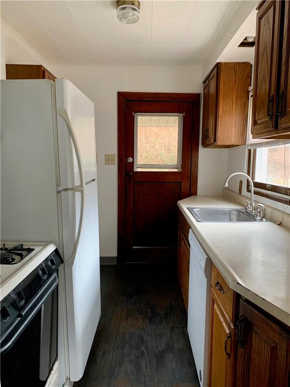 246-248 Bailies Run Road Creighton, PA 15030 - Photo 8 of 25 NICELY UPDATED AND EQUIPPED KITCHEN WITH ENTRY TO REAR DECK AND YARD! UNIT 246