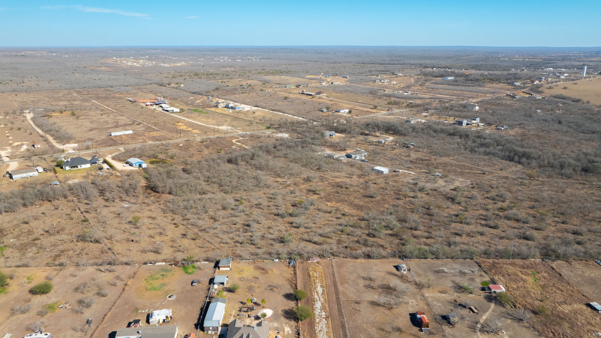 3991 Barth Road Lockhart, TX 78644 - Photo 15 of 27 Aerial overview of property's location with rural landscape and a desert landscape