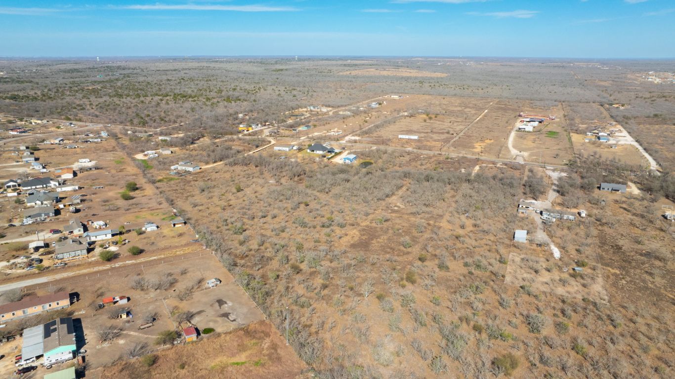 3991 Barth Road Lockhart, TX 78644 - Photo 17 of 27 Aerial overview of property's location with rural landscape and a desert landscape