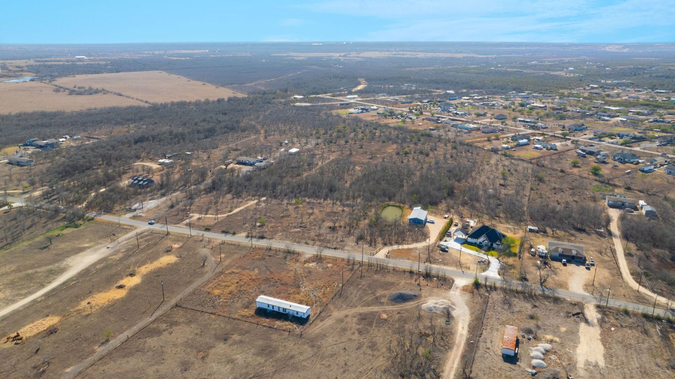 3991 Barth Road Lockhart, TX 78644 - Photo 2 of 27 Aerial view of property and surrounding area featuring rural landscape