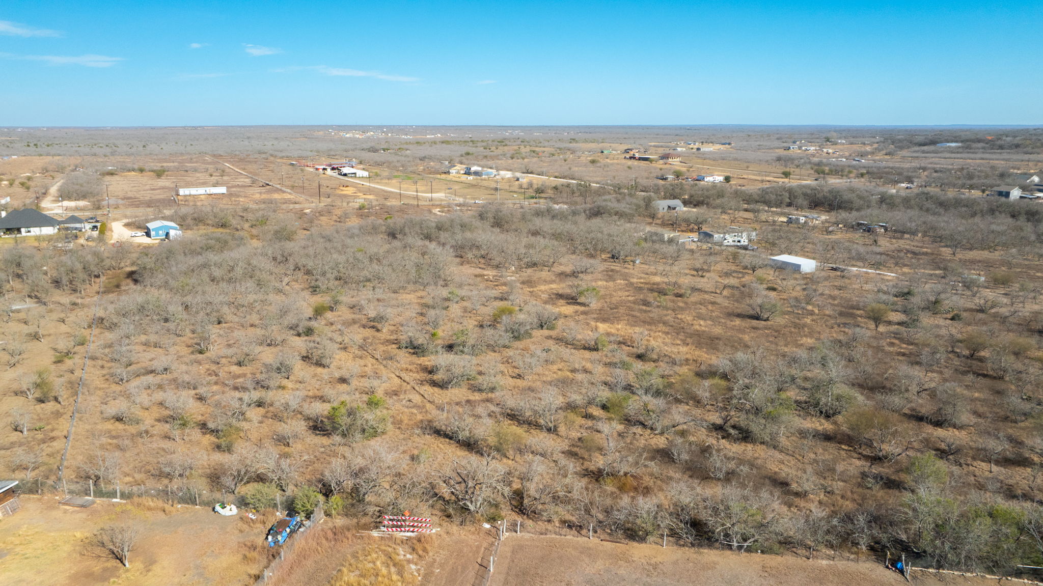 3991 Barth Road Lockhart, TX 78644 - Photo 25 of 27 Aerial view of property and surrounding area featuring rural landscape and a desert landscape