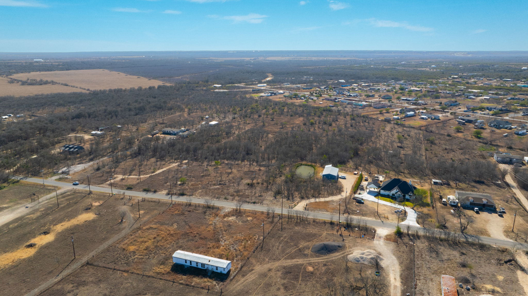 3991 Barth Road Lockhart, TX 78644 - Photo 5 of 27 Aerial overview of property's location featuring rural landscape