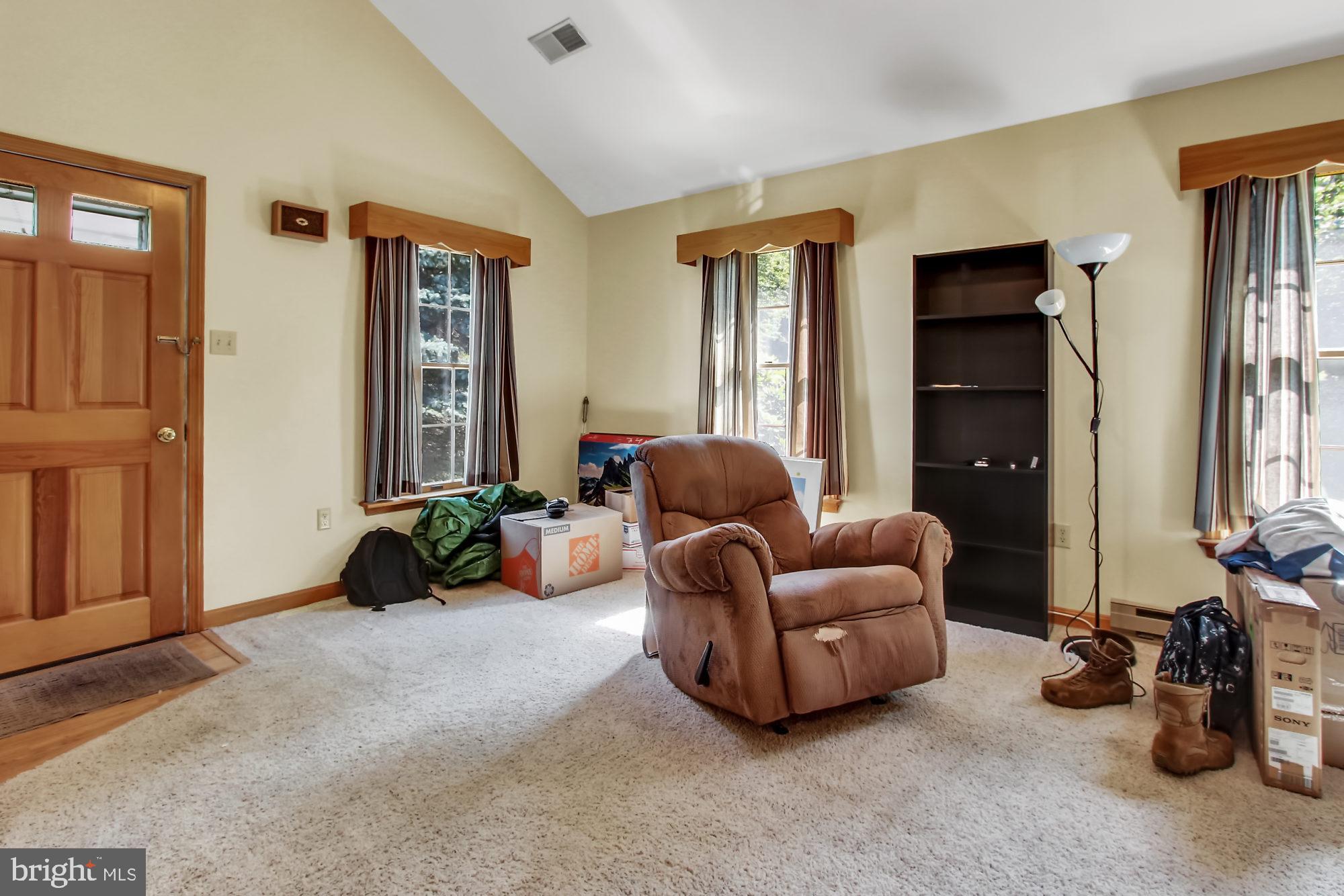 22364 Durberry Road Smithsburg, MD 21783 - Photo 24 of 37 Full in-law suite - Living room w/vaulted ceiling