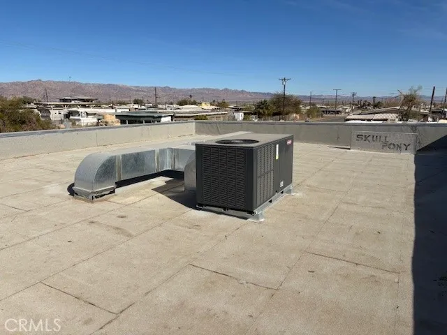 a kitchen with a stove sink and cabinets
