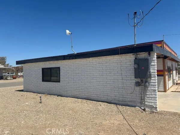a view of a house with a street