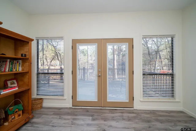 a view of livingroom with furniture and bookshelf