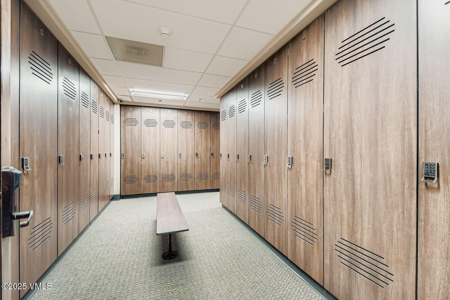 1120 Village Road, Unit 204 Beaver Creek, CO 81620 - Photo 22 of 29 a hallway with sliding door and mountain view