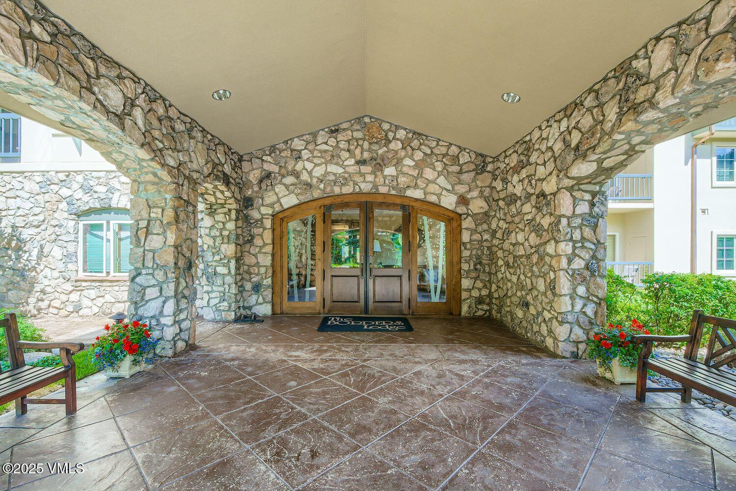 1120 Village Road, Unit 204 Beaver Creek, CO 81620 - Photo 29 of 29 a front view of a house with a garden