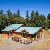 an aerial view of a house with swimming pool