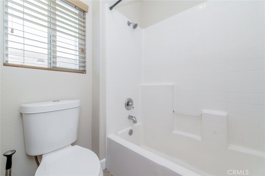4947 Plumtree Court Riverside, CA 92504 - Photo 35 of 46 The 2nd bathroom with dual sinks and a shower-over-tub