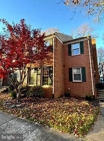 a view of a house with a garden