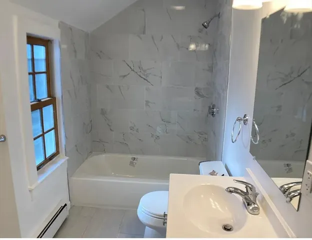 a bathroom with a sink and a bathtub
