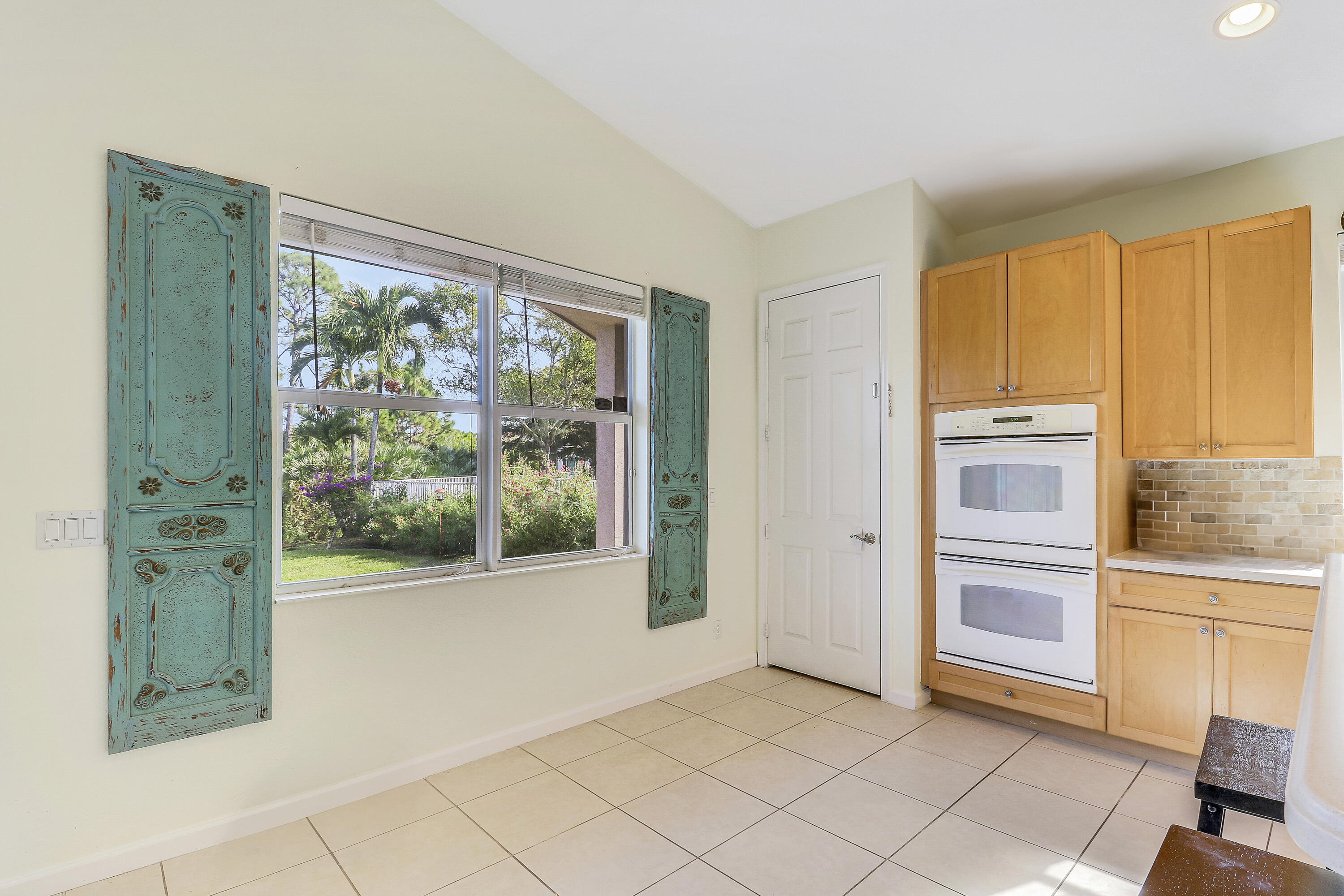5017 Southeast Graham Drive Stuart, FL 34997 - Photo 11 of 38 a view of a kitchen with a sink and a window