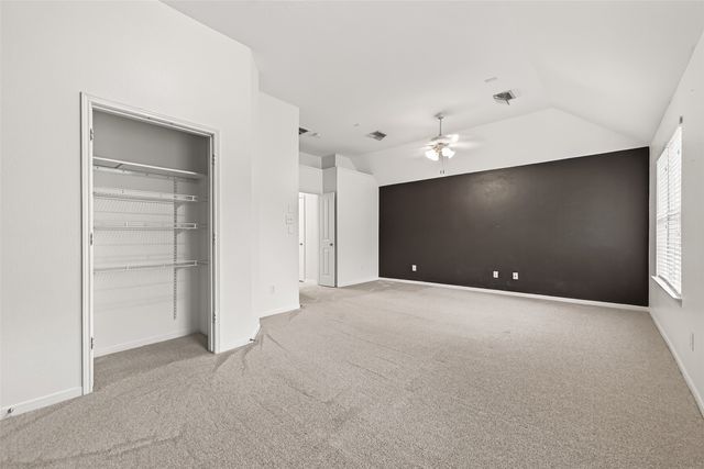 a view of an empty room with a projector