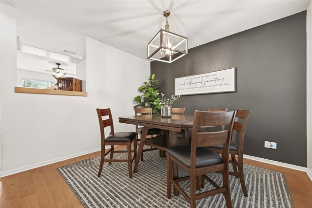 a view of a dining room with furniture