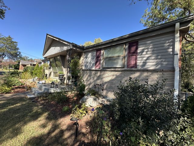 a front view of house with yard