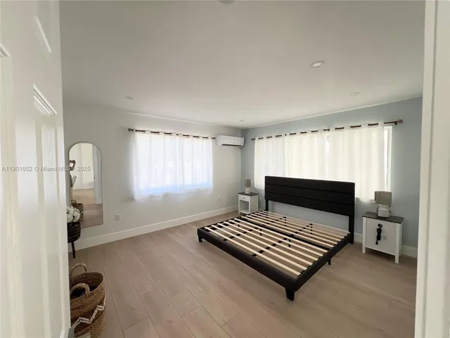 a kitchen with a sink a stove and refrigerator