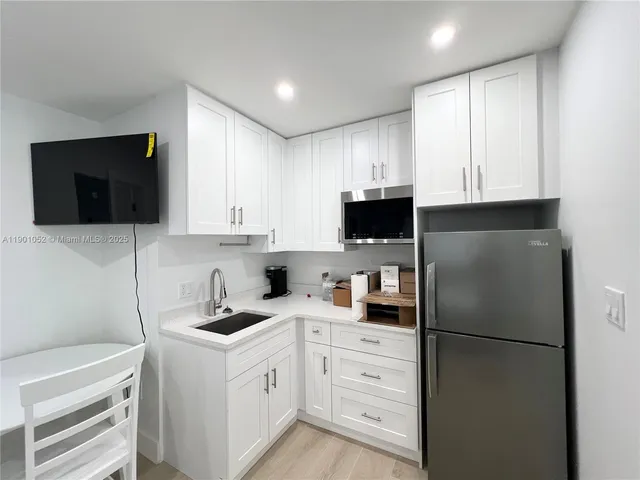 a bathroom with a shower and a tub