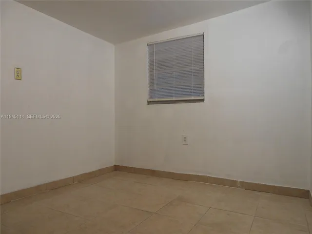 a kitchen with a sink a stove and refrigerator